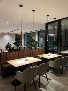 Um restaurante ou outro lugar para comer em Hotel Canal Beagle