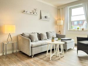 Posezení v ubytování Sünnslag Wohnung 099
