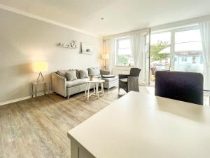 Posezení v ubytování Sünnslag Wohnung 099