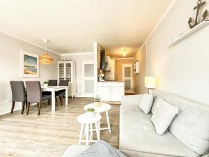 Posezení v ubytování Sünnslag Wohnung 099