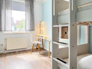Postel nebo postele na pokoji v ubytování Sünnslag Wohnung 099