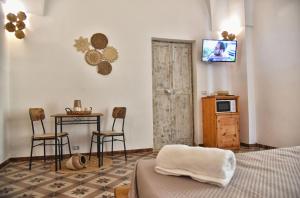 TV a/nebo společenská místnost v ubytování B&B La casa di Patty