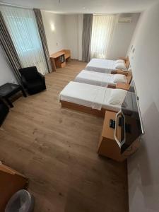 Postel nebo postele na pokoji v ubytování Hotel Elegance + 33 fotografií