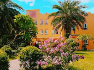 Aed väljaspool majutusasutust Sharjah B&B