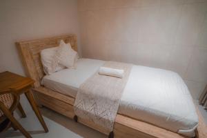 Postel nebo postele na pokoji v ubytování Made Arsa Homestay