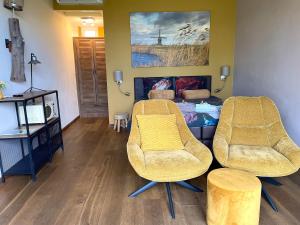 Posezení v ubytování B&B De Donk