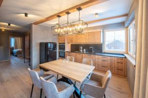 Kuchyň nebo kuchyňský kout v ubytování Filzsteinresort Wohnungen Top 1