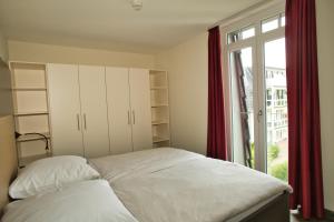 Postel nebo postele na pokoji v ubytování Resort Deichgraf Resort Deichgraf 31-12