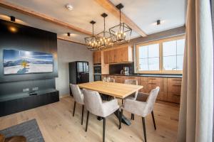 Kuchyň nebo kuchyňský kout v ubytování Filzsteinresort Wohnungen Top 6