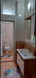 Koupelna v ubytování Bahar apart + 15 fotografií