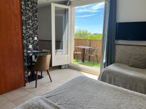 Postel nebo postele na pokoji v ubytování GuestHouse Le Patio34