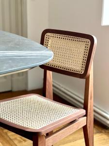 a table and a chair next to a table and a table at L'Opéra, hyper centre de Rennes in Rennes +13 photos
