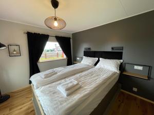 Postel nebo postele na pokoji v ubytování Private home in Ólafsvík