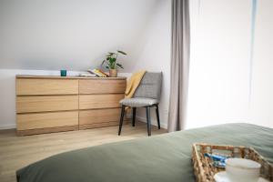 Postel nebo postele na pokoji v ubytování Domki wakacyjne 4 YOU