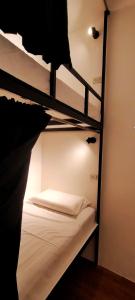 Postel nebo postele na pokoji v ubytování Puy-An, A Nomad Hostel