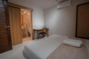 Postel nebo postele na pokoji v ubytování Made Arsa Homestay