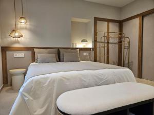 Katil atau katil-katil dalam bilik di Casa Benigno estudio 3p 33A01