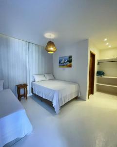 En eller flere senge i et værelse på Casa nobre Trancoso