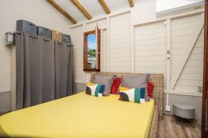 Postel nebo postele na pokoji v ubytování Bungalow Cactus