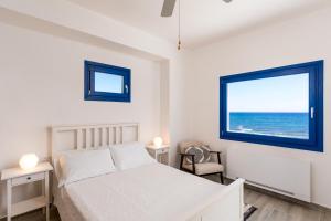 Postel nebo postele na pokoji v ubytování Seaside Serenity House