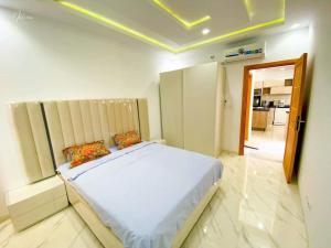 Giường trong phòng chung tại villa Prestige +3 ảnh