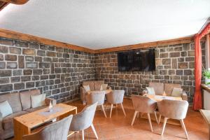 TV a/nebo společenská místnost v ubytování Hotel El Laresh