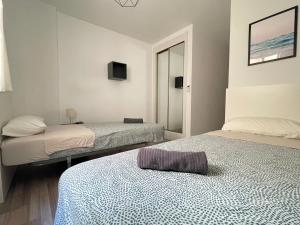 Łóżko lub łóżka w pokoju w obiekcie Central & Beautiful Apartment by DV Properties #P2