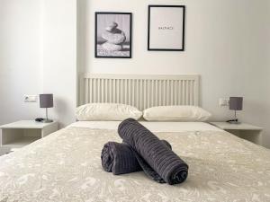 Łóżko lub łóżka w pokoju w obiekcie Central & Beautiful Apartment by DV Properties #P2