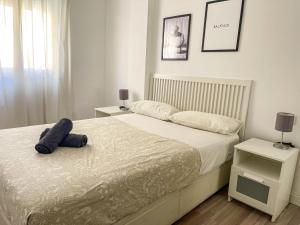 Łóżko lub łóżka w pokoju w obiekcie Central & Beautiful Apartment by DV Properties #P2