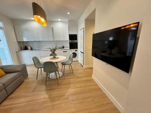 Et tv og/eller underholdning på Como en casa