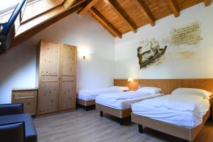 Postel nebo postele na pokoji v ubytování Hotel El Laresh