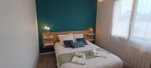 Łóżko lub łóżka w pokoju w obiekcie Auva - SILS Maison 48 m2 à 5 minutes à pied de la plage