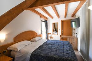 Postel nebo postele na pokoji v ubytování Hotel El Laresh