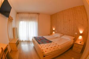 Postel nebo postele na pokoji v ubytování Hotel El Laresh