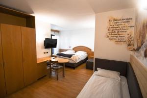 Postel nebo postele na pokoji v ubytování Hotel El Laresh