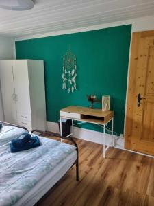 Voodi või voodid majutusasutuse Hotel - Haus Biasca toas
