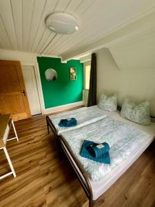 Voodi või voodid majutusasutuse Hotel - Haus Biasca toas