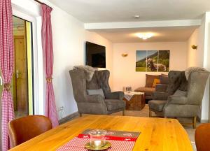 TV a/nebo společenská místnost v ubytování Haus Leni