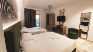 Postel nebo postele na pokoji v ubytování Hotel Ruko Boutique