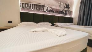 Postel nebo postele na pokoji v ubytování Hotel Ruko Boutique