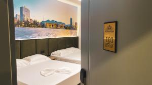 Postel nebo postele na pokoji v ubytování Hotel Ruko Boutique