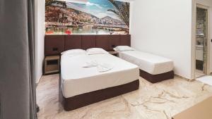 Postel nebo postele na pokoji v ubytování Hotel Ruko Boutique