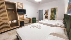 Postel nebo postele na pokoji v ubytování Hotel Ruko Boutique