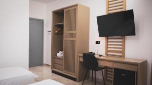 TV a/nebo společenská místnost v ubytování Hotel Ruko Boutique