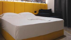 Postel nebo postele na pokoji v ubytování Hotel Ruko Boutique