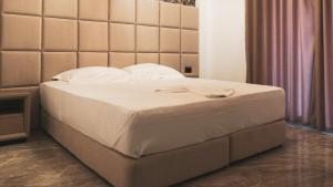 Postel nebo postele na pokoji v ubytování Hotel Ruko Boutique