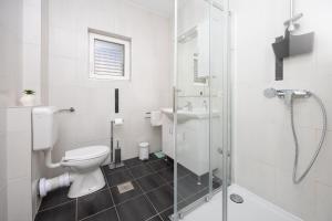 Vannituba majutusasutuses Apartman Markulin