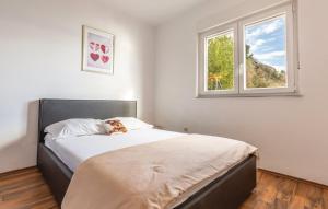 Postel nebo postele na pokoji v ubytování Villa Aria + 10 fotografií