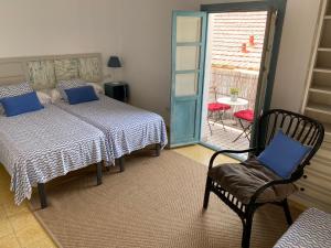 Ein Bett oder Betten in einem Zimmer der Unterkunft Blue Beach House ATICO CON TERRAZA