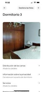 a screenshot of a bedroom with a bed and a website at Pensión montoxo in Cedeira